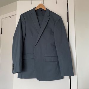 Used J. Crew “Thompson” slim fit blue suit. Jacket is 40R and pants are 33”x32”.